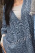 Пончо с ажурным узором из кос