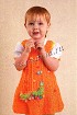 Оранжевый сарафан с гусеницей