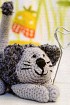 Кот-держатель для фотографий