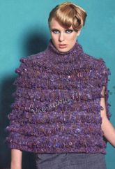 Пончо спицами с узором из вытянутых петель Пончо спицами с узором из вытянутых петель